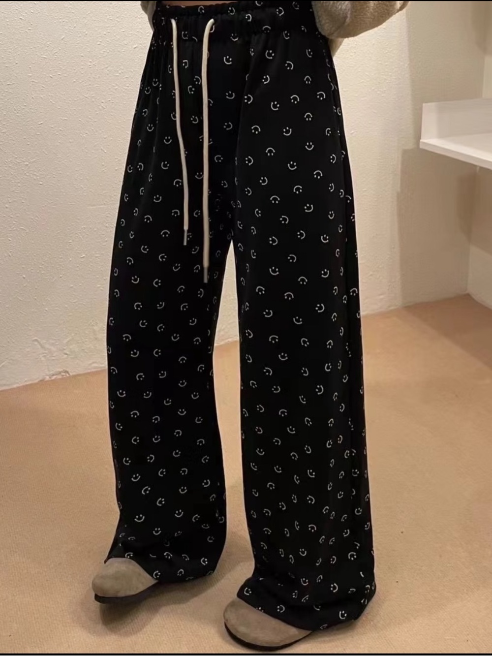 Wide-Leg Black Smiley Print Lounge Pants with Adjustable Ankle